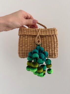 Nannacay Woven Straw Mini Bag with Green Pom Pom Charm